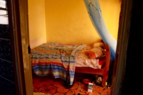 This is what $4/night buys you - small room and no no toilet seat or electricity but there was running water!