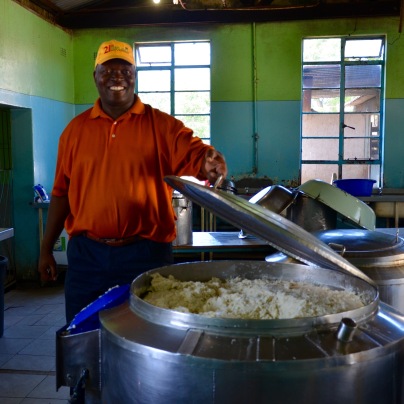 Touring the kitchen - Humfrey shows us the vat of maize meal that feeds the 1000 students and staff
